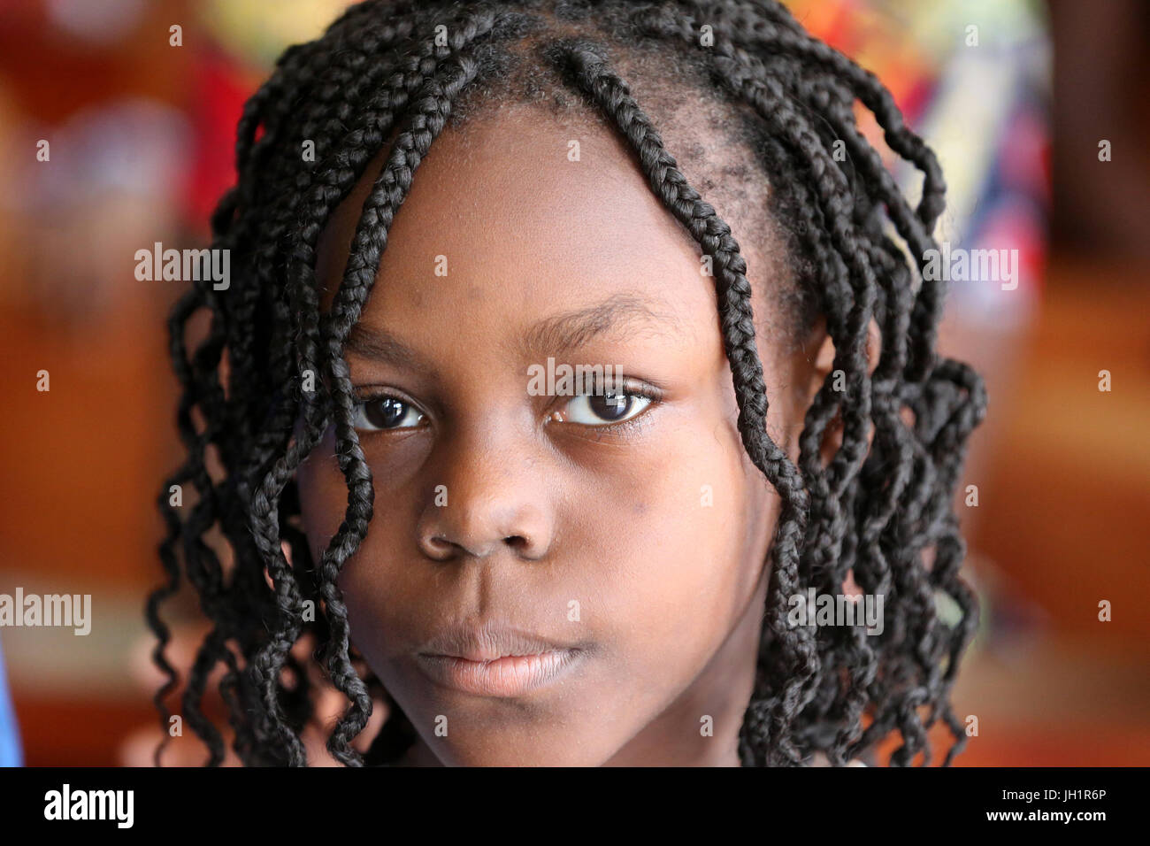 African girl wearing braids. Lome. Togo. Stock Photo