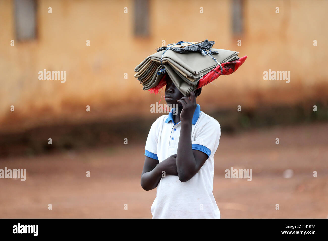 African boy. Stret seller.  Togo. Stock Photo