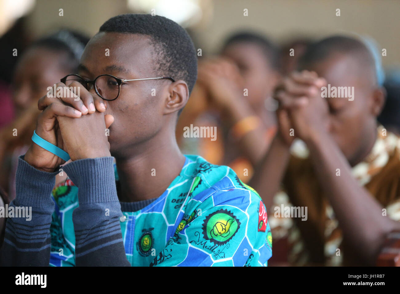 Sunday morning catholic mass.  Prayer.  Lome. Togo. Stock Photo