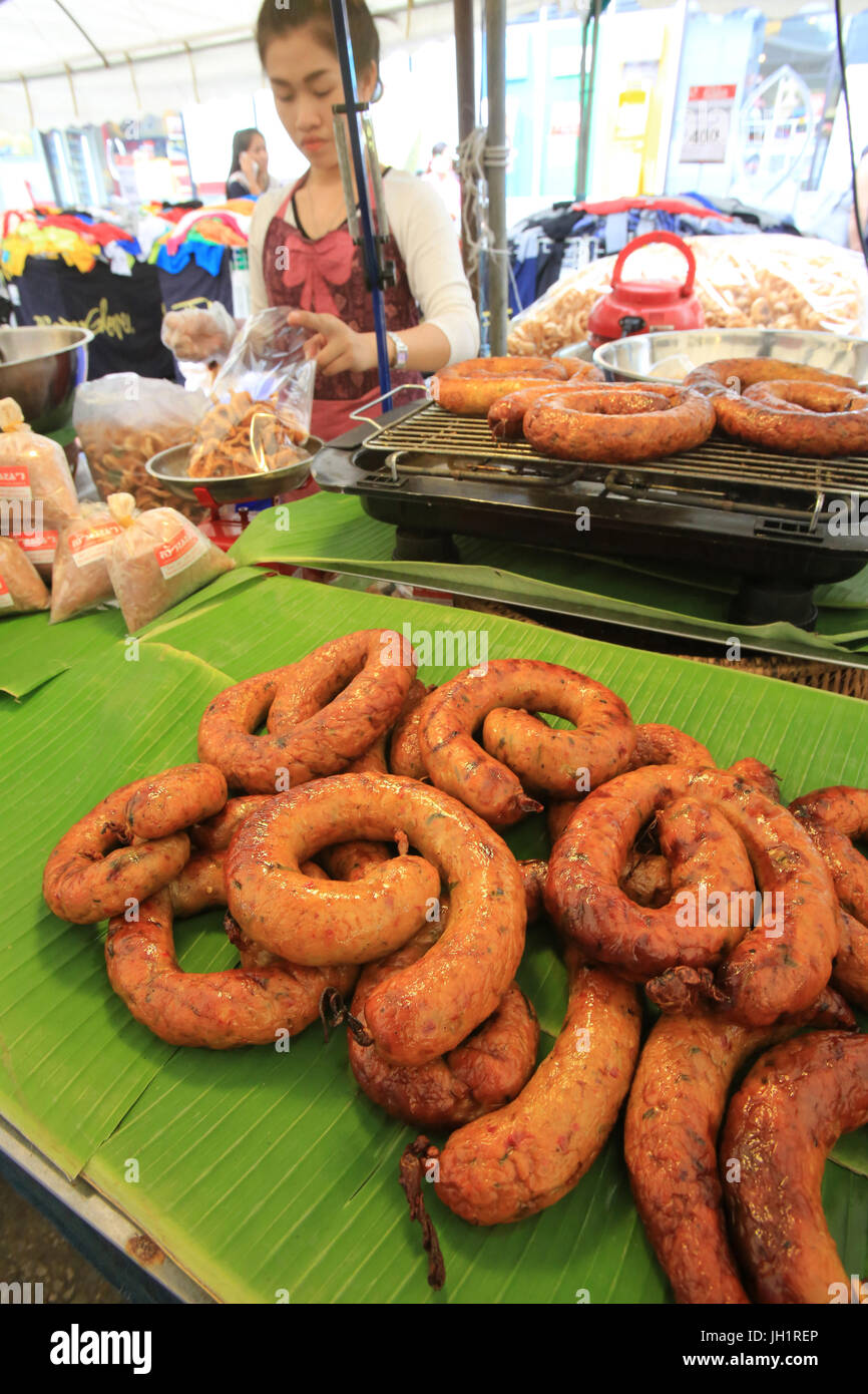 Street vendor. Sausages. Bangkok Food Market.  Thailand. Stock Photo