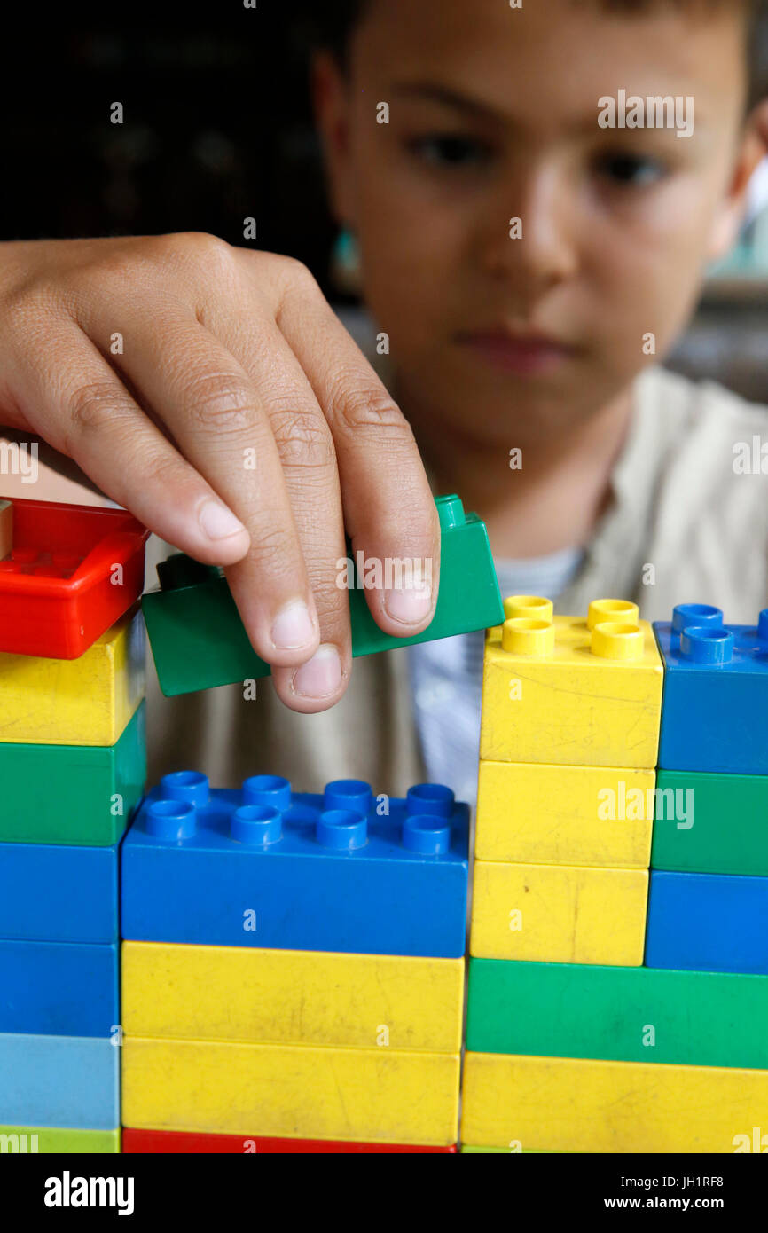 Boy playing with lego hires stock photography and images Alamy(02)