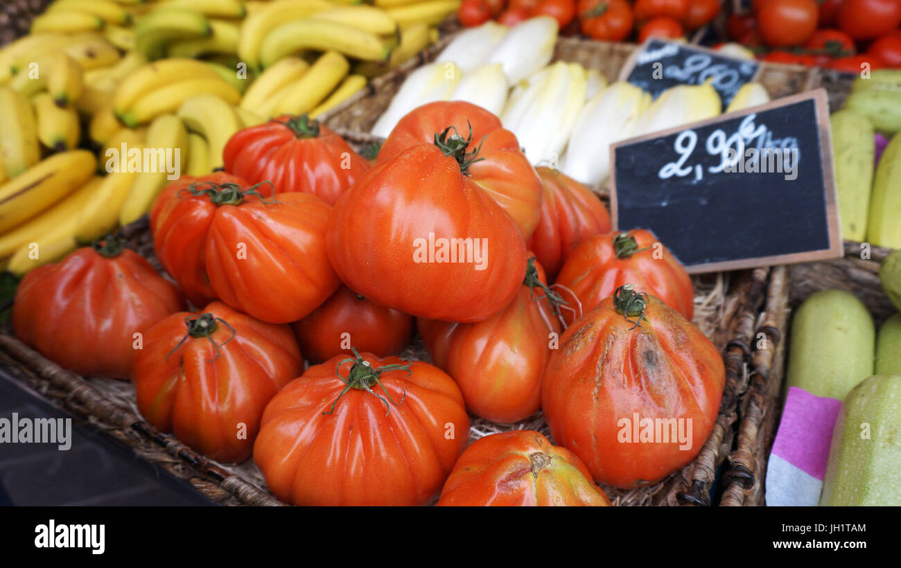 Tomatoes at traditional market in Spain Stock Photo - Alamy
