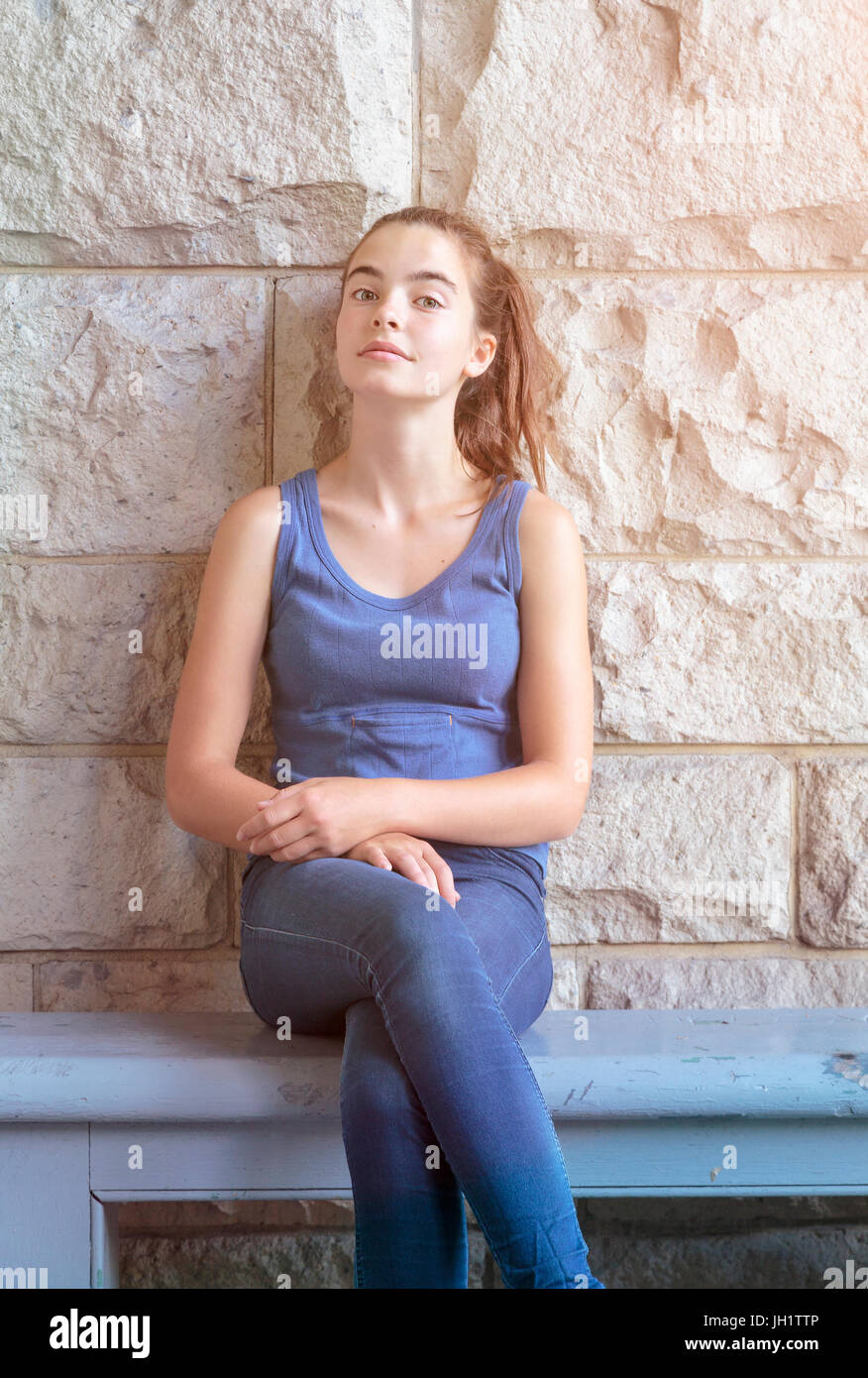 Young teen female sitting legs hi-res stock photography and images - Alamy