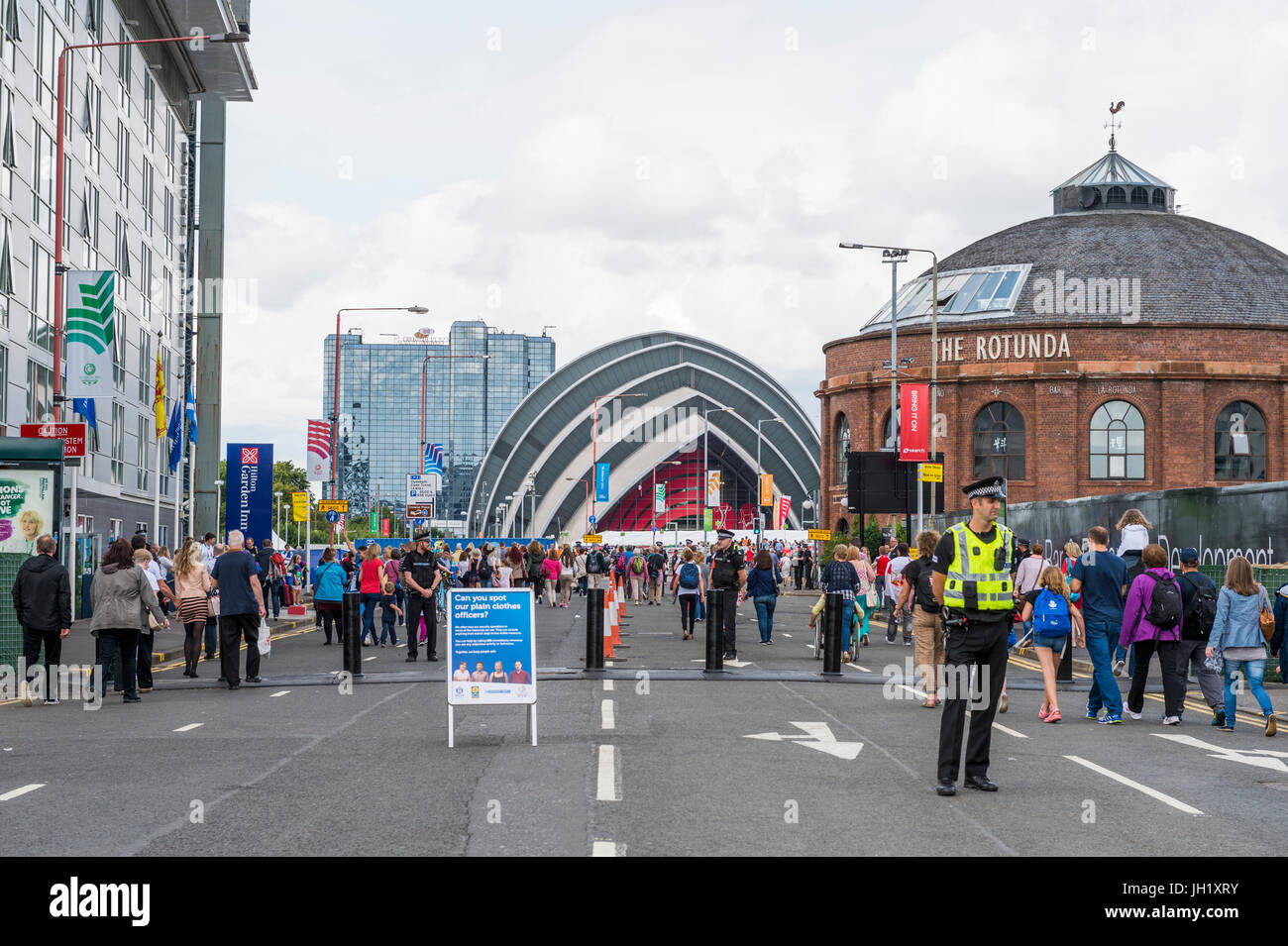 Glasgow, Scotland, UK - August 1, 2014: Member of the public making their way to a from events during the 2014 Commonwealth Games in Glasgow Stock Photo