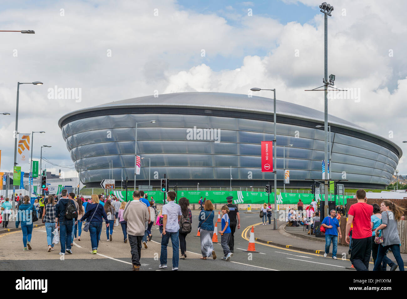 Glasgow, Scotland, UK - August 1, 2014: Member of the public making their way to a from events during the 2014 Commonwealth Games in Glasgow Stock Photo