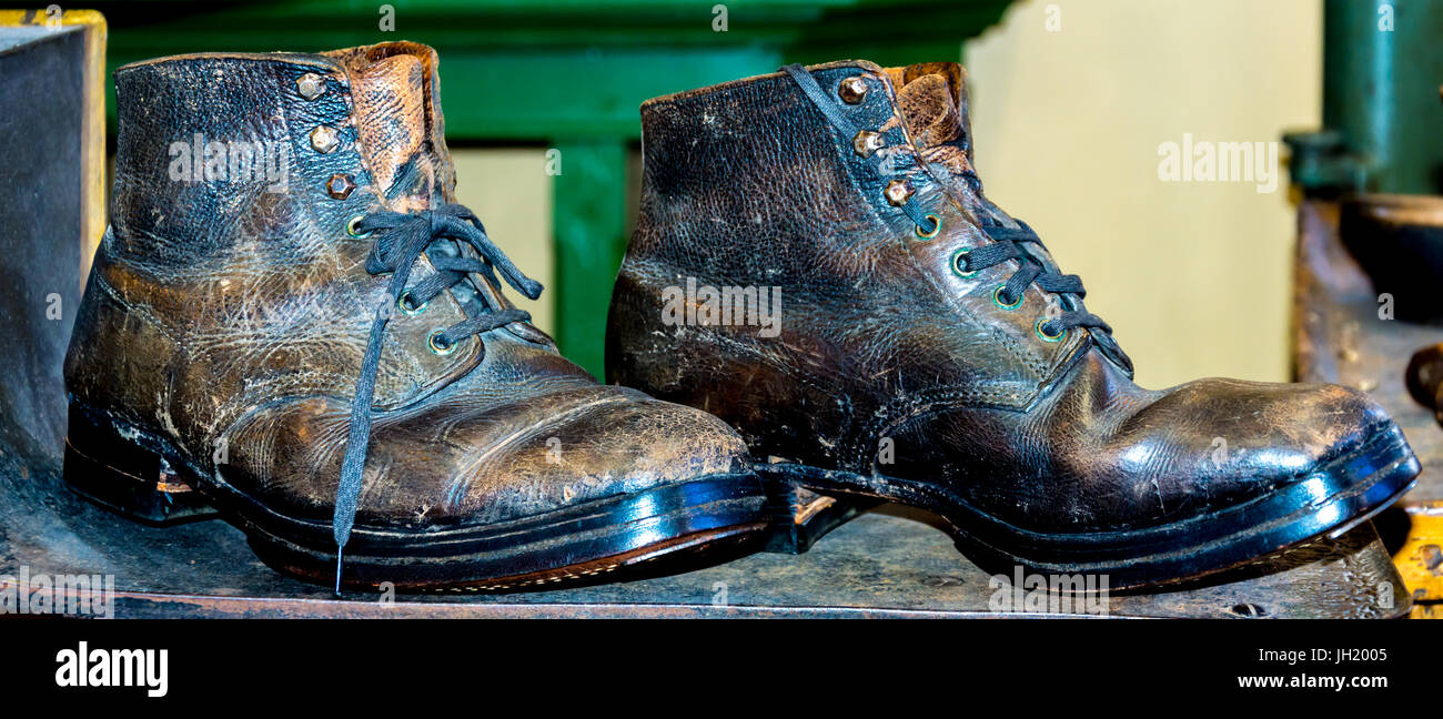 old worn out leather ankle boots Stock Photo Alamy