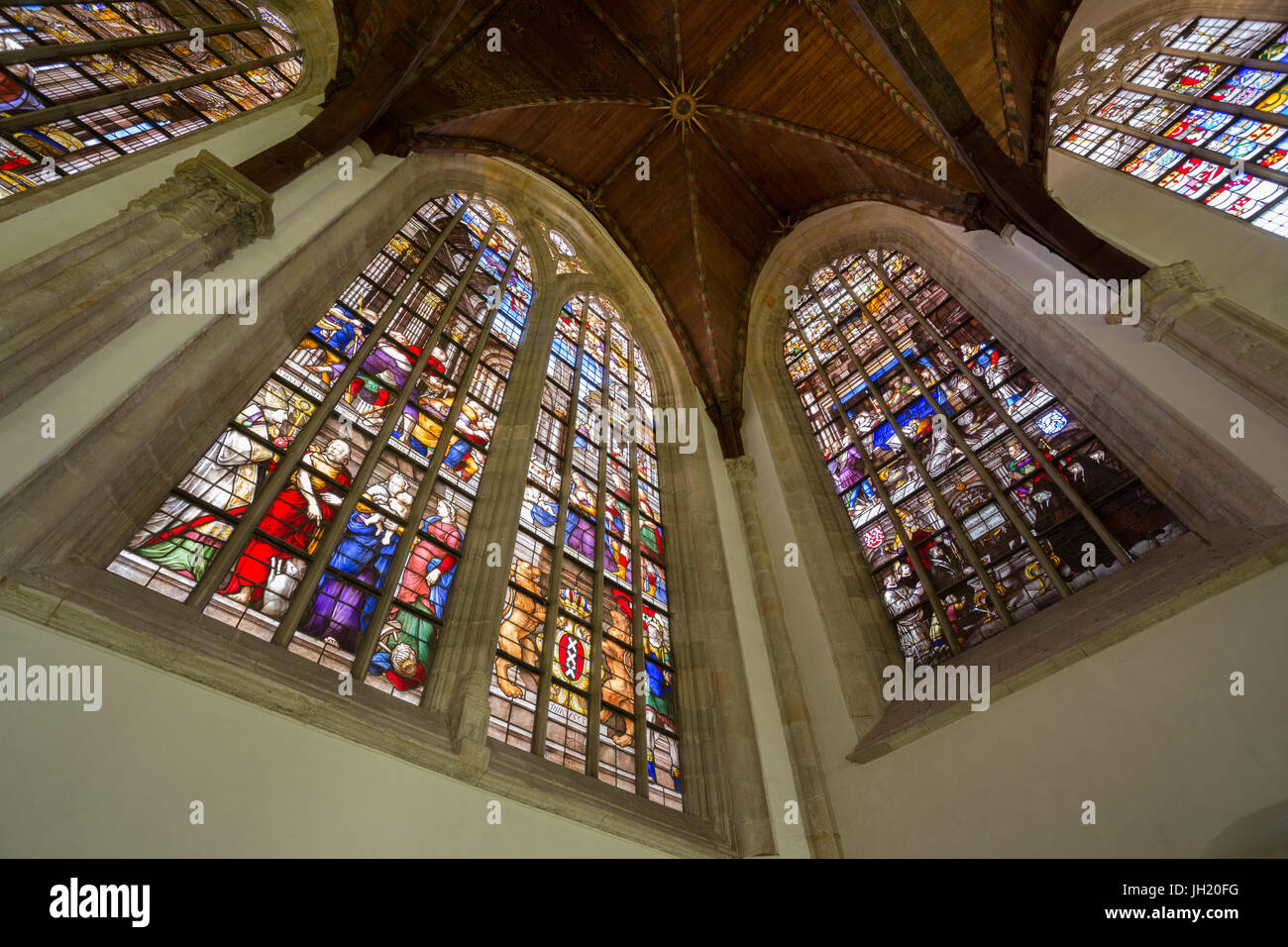 OLD CHURCH OR DE OUDE KERK, AMSTERDAM, THE NETHERLANDS - JULI 7, 2017: Famous stained glass windows in the Maria Chapel. Stock Photo