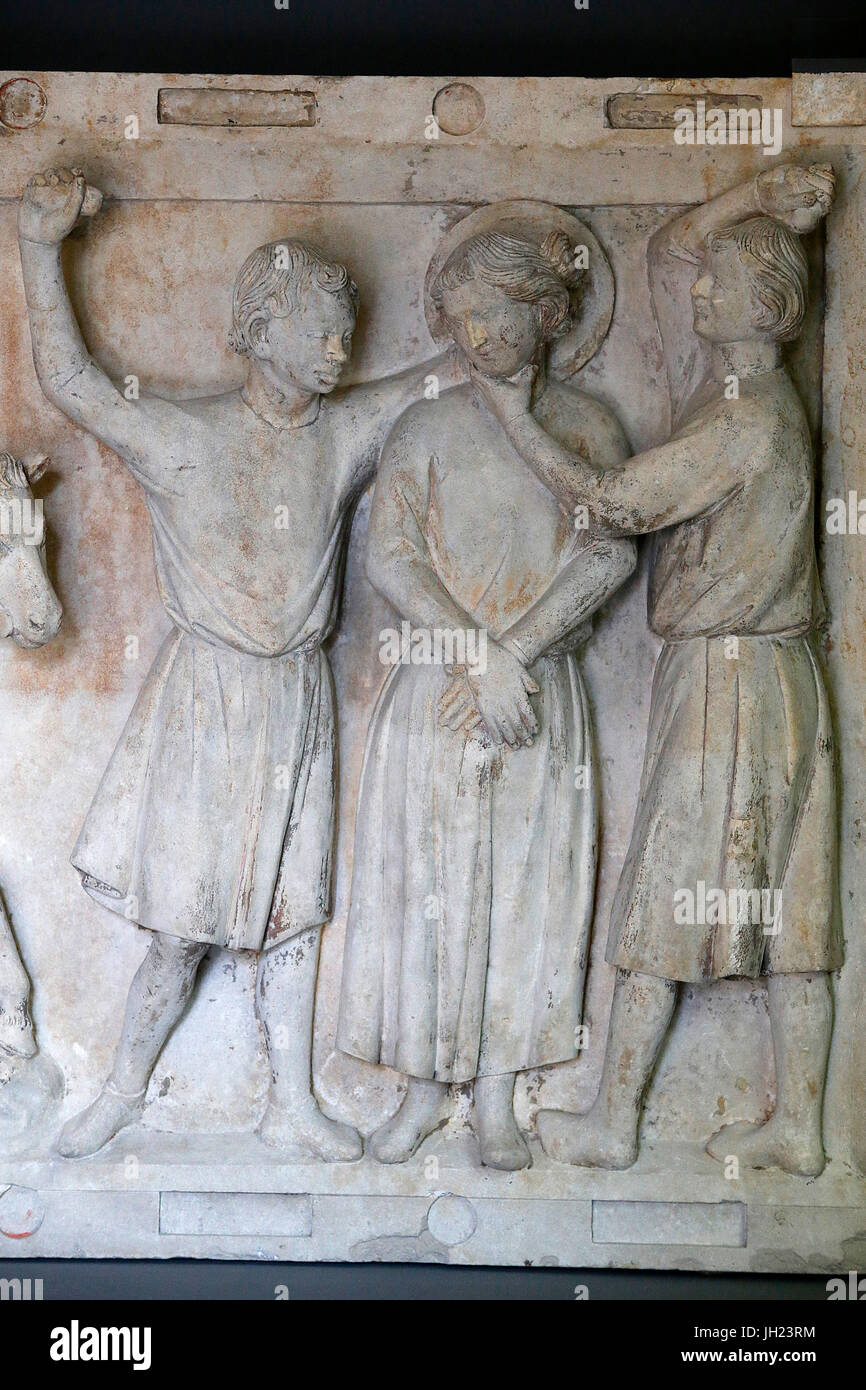 Louvre museum. Saint Hippolyte martyred. Stone. From St Denis abbey church, Ile-de-France, 13th century. Stock Photo