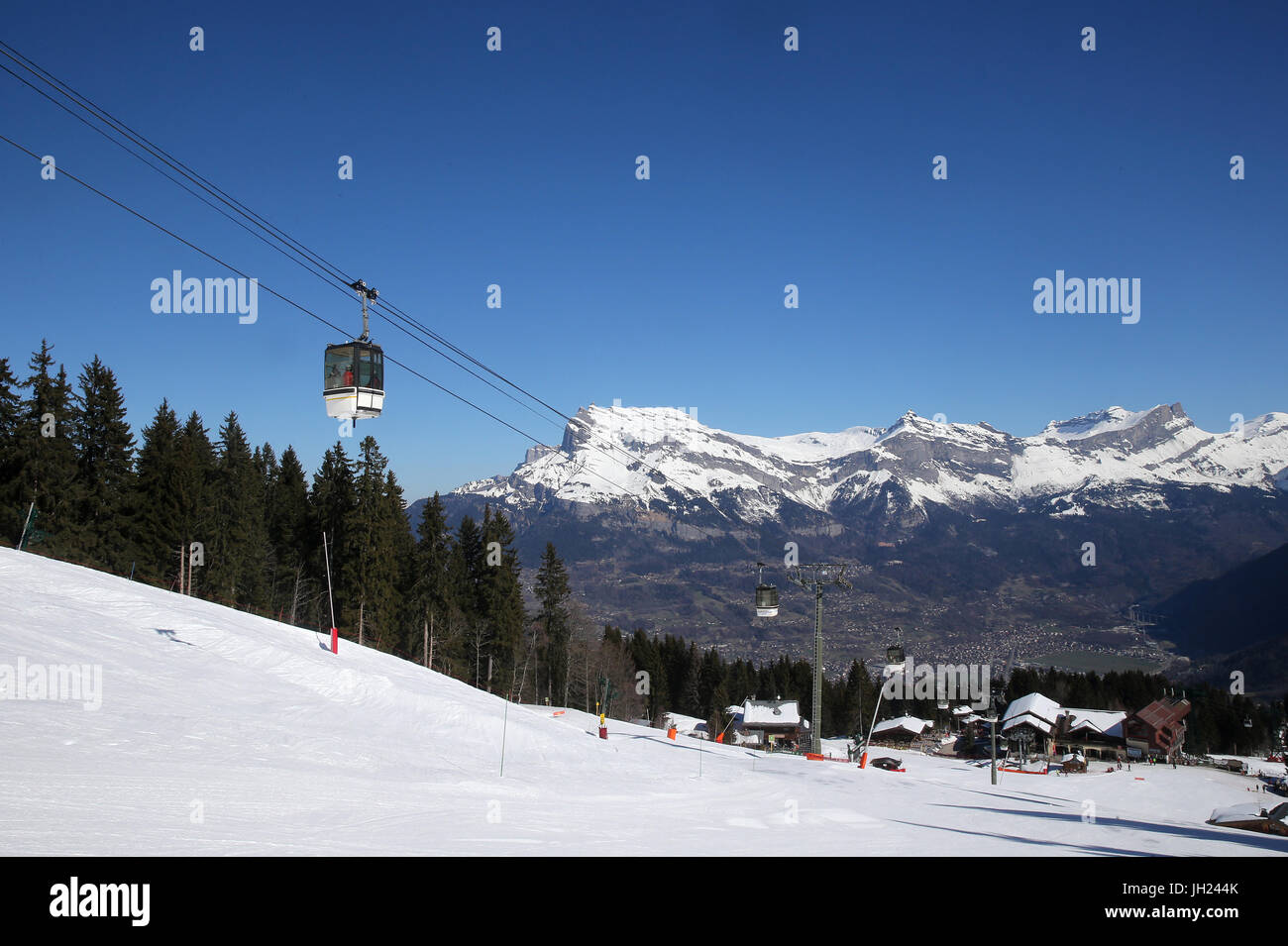 French Alps.  Mont-Blanc massif.  Skiing And Overhead Cable Car. France. Stock Photo