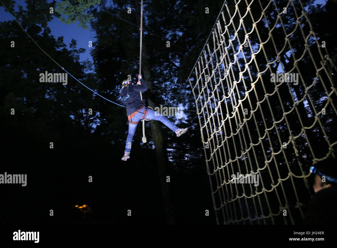 Adventure park in woods.  France. Stock Photo