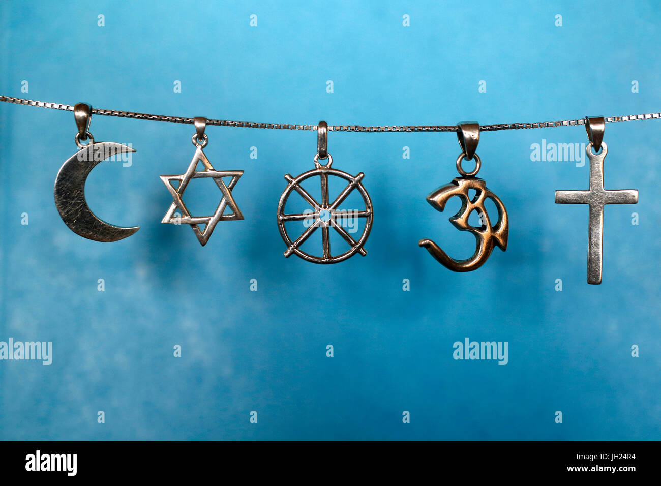 Symbols of islam, judaism, buddhism, hinduism and christianity. Stock Photo