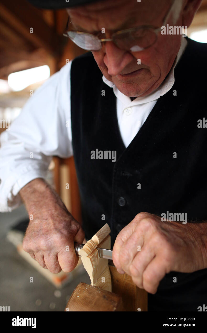 Old Domancy craft festival.  Wood carver.  France. Stock Photo