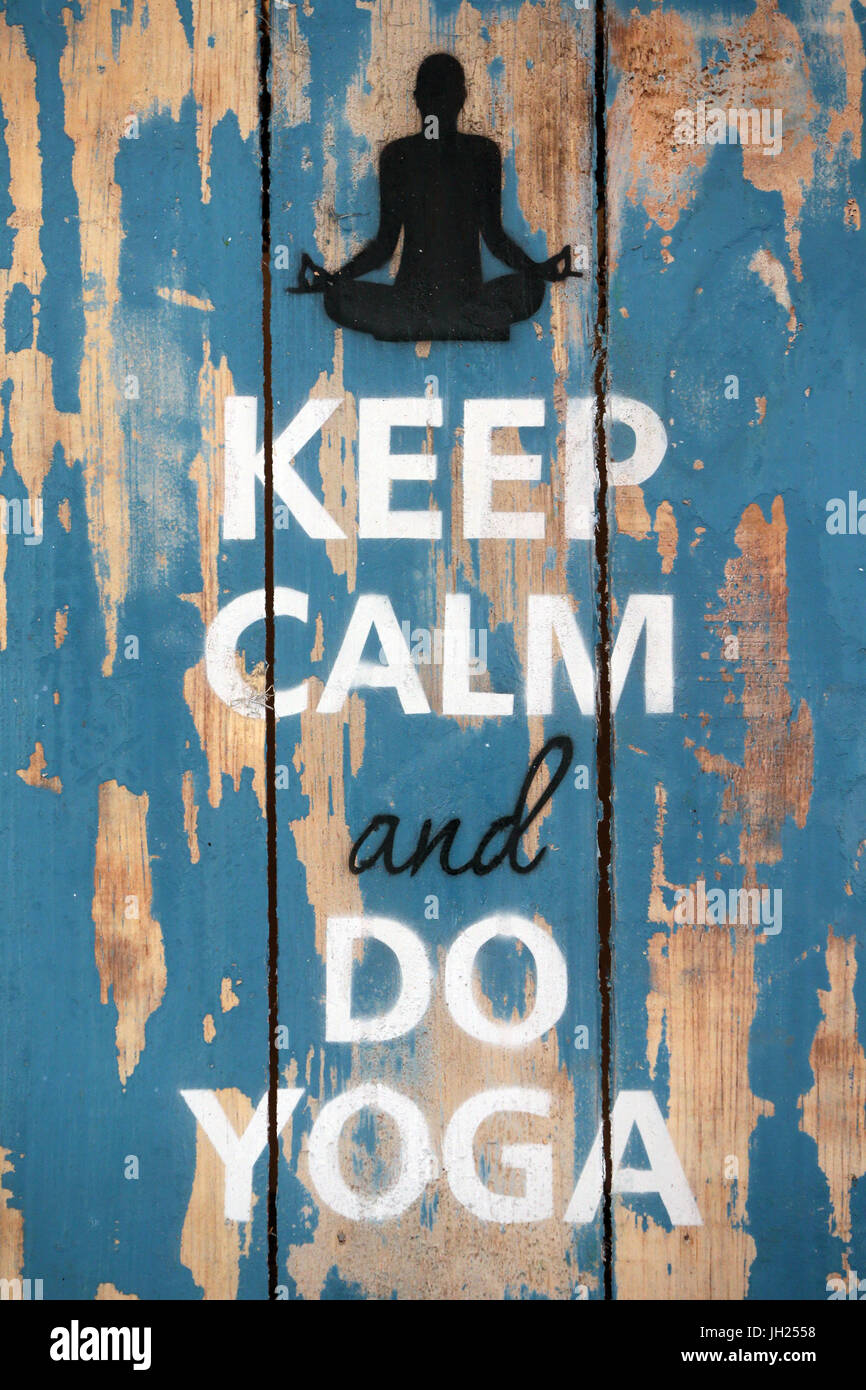 Keep calm and do yoga.  France. Stock Photo
