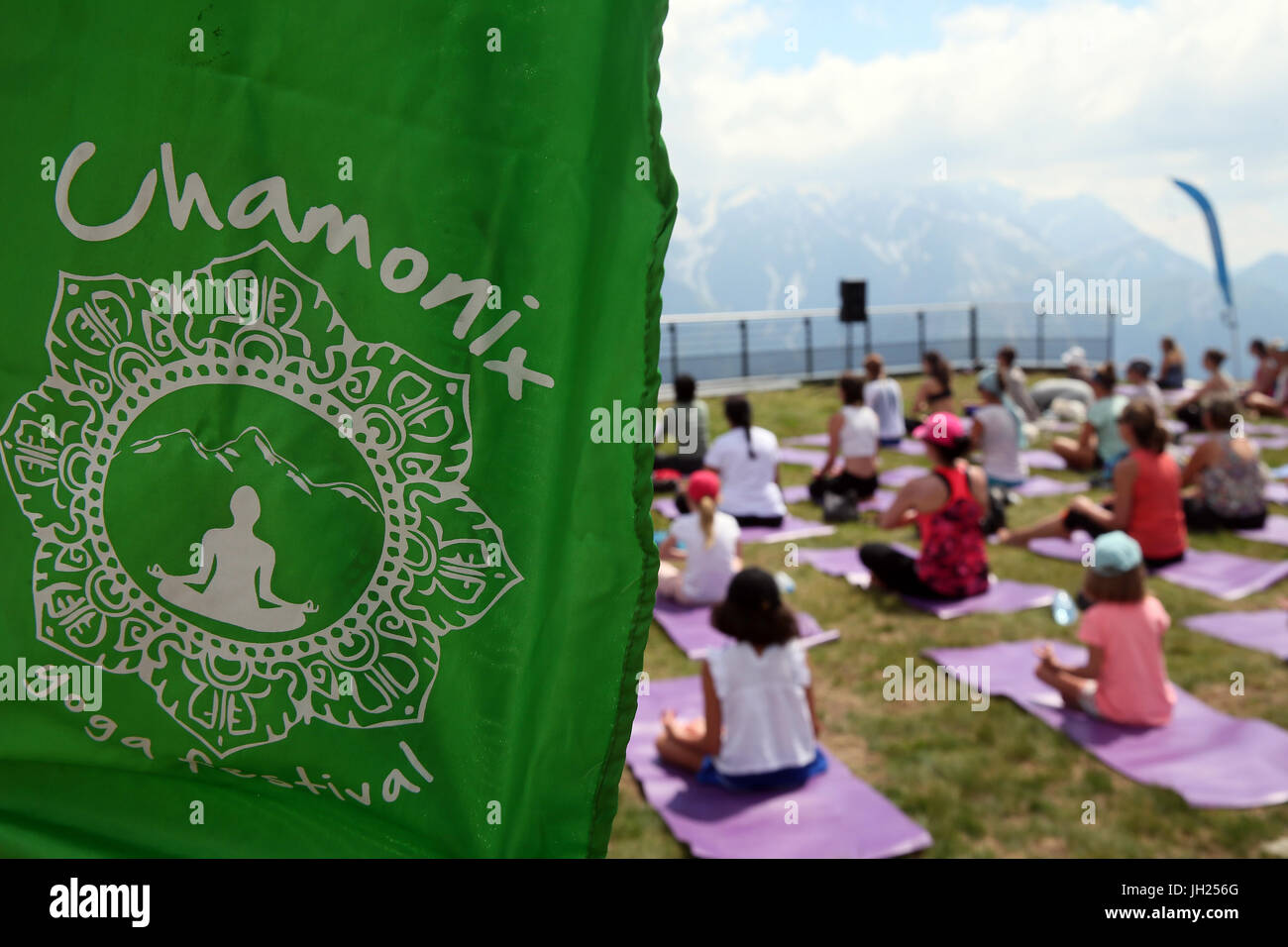 Chamonix Yoga Festival. Yoga class stretching at moutain. France Stock