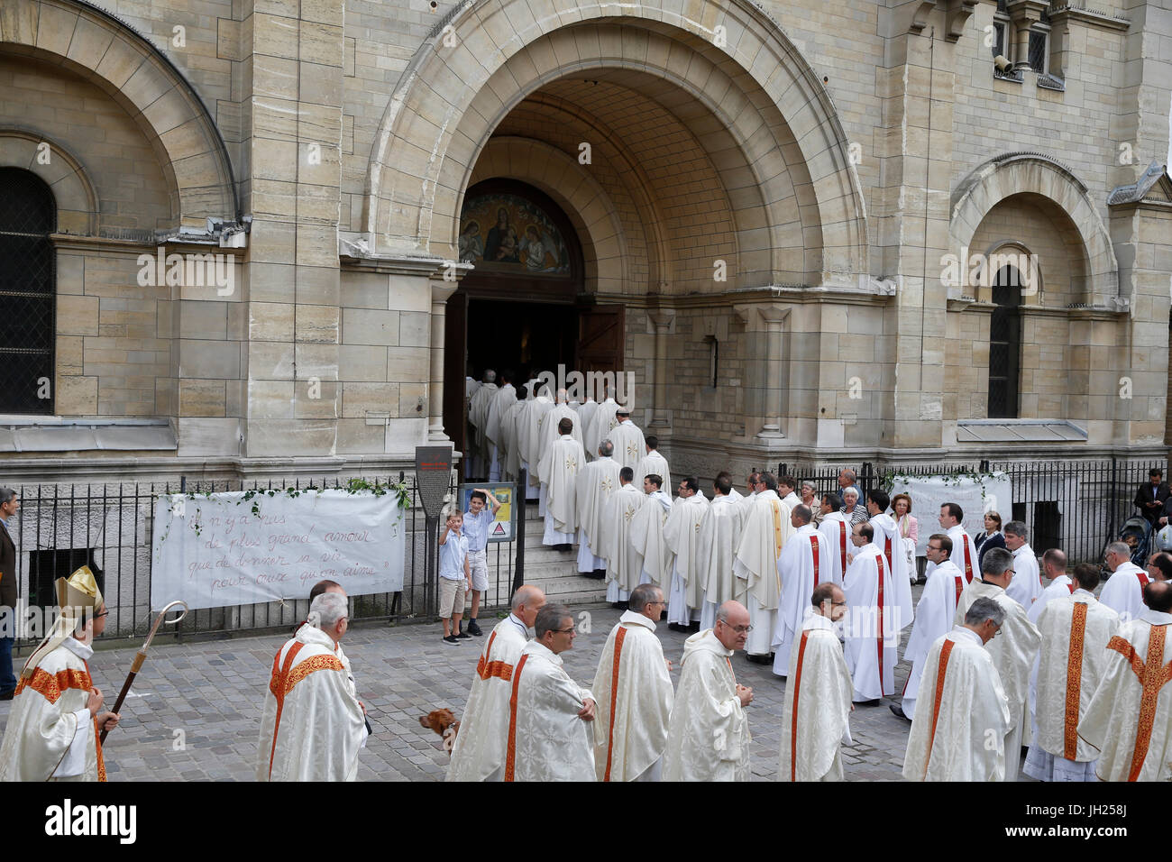 Deacon ordinations in Notre Dame du Travail church, Paris. Entry procession. France. Stock Photo