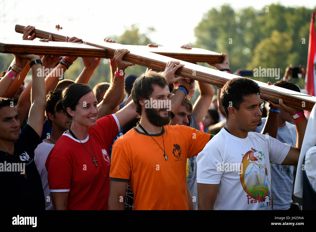 World Youth Day. Krakow. 2016. Pilgrims carrying the WYD cross. Poland. Stock Photo