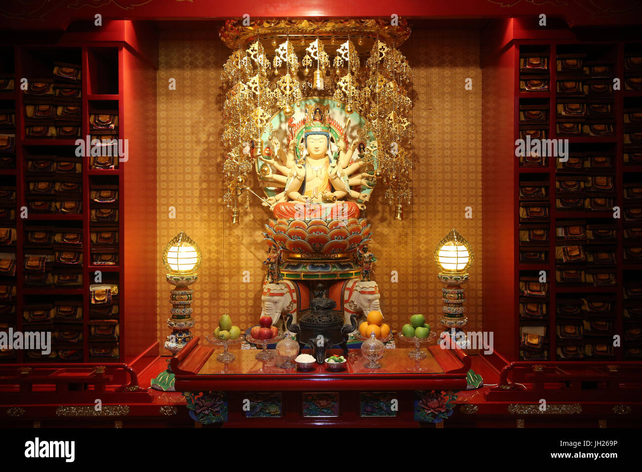 Buddha Tooth Relic Temple in Chinatown. Longevity Bodhisattva Samantabhadra statue.  Singapore. Stock Photo