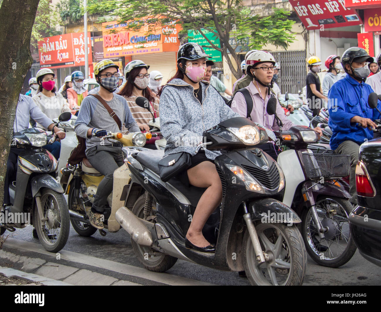 Motorbike traffic and facemasks, Hanoi, Vietnam, Indochina, Southeast Asia, Asia Stock Photo