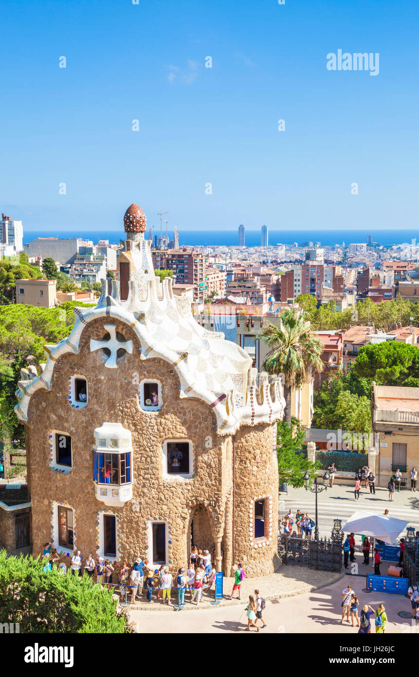 Casa del Guarda lodge by Antoni Gaudi at Parc Guell, UNESCO, with a skyline view of the city of Barcelona, Catalonia, Spain Stock Photo