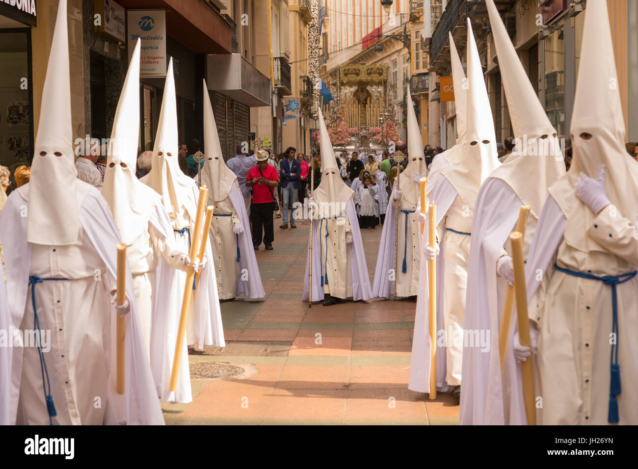 Locals taking part in the Resurrection Parade on Easter Sunday, Malaga, Costa del Sol, Andalusia, Spain, Europe Stock Photo