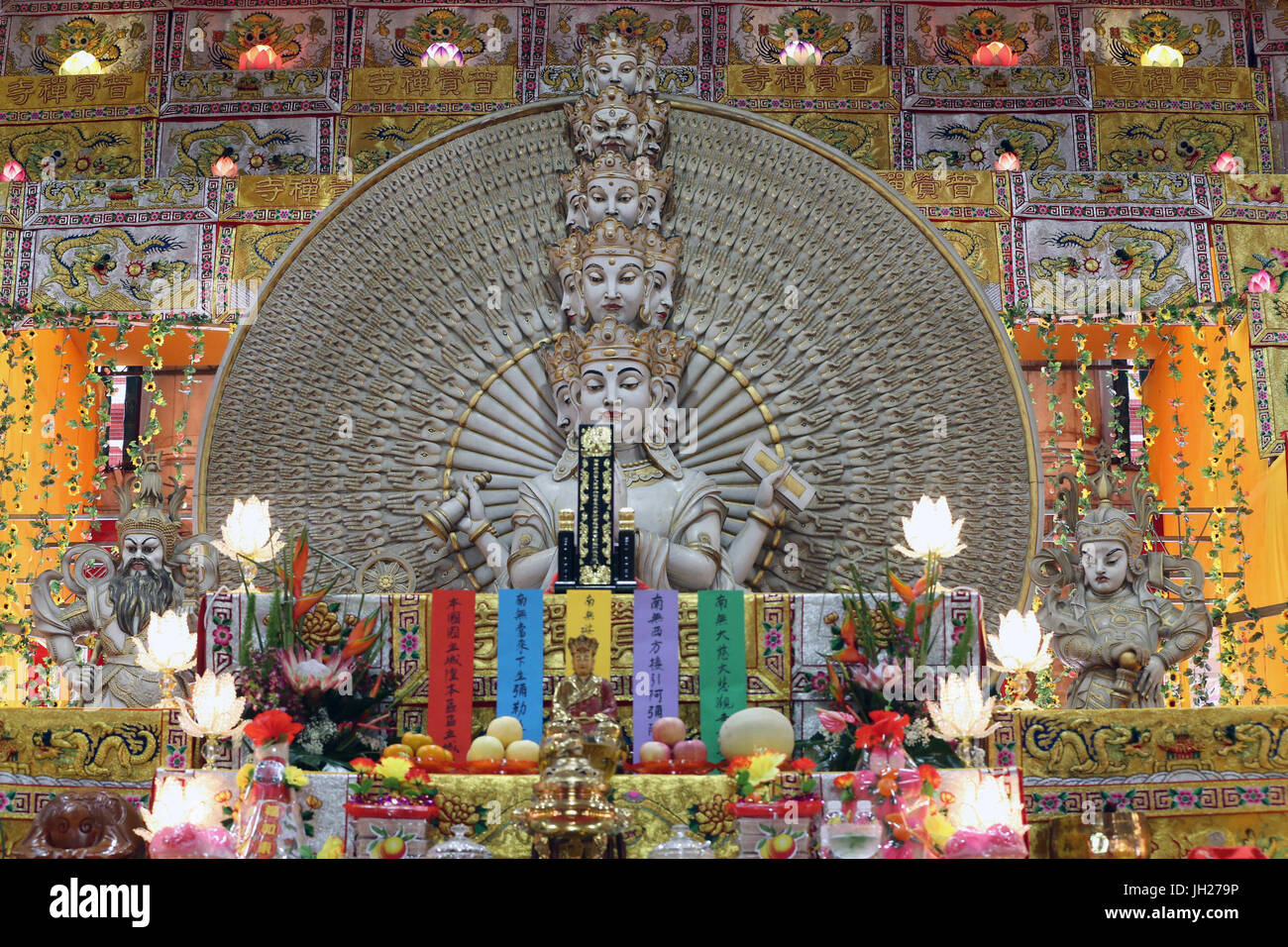 Kong Meng San Phor Kark See Monastery. Hall of great compassion. Avalokiteshvara Bodhisvattva of a Thousand Arms and Eyes statue. Singapore. Stock Photo