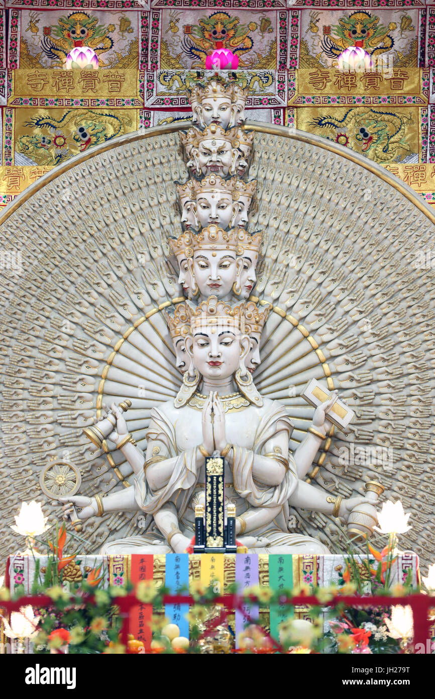 Kong Meng San Phor Kark See Monastery. Hall of great compassion. Avalokiteshvara Bodhisvattva of a Thousand Arms and Eyes statue. Singapore. Stock Photo