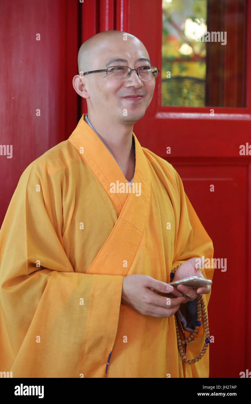 Kong Meng San Phor Kark See Monastery. Smiling monk.  Singapore. Stock Photo
