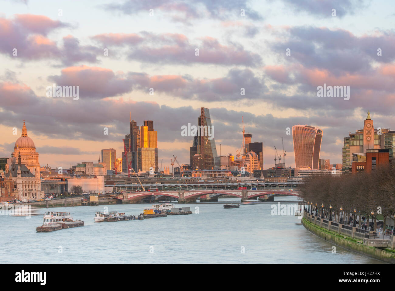 A glow over The City of London at sunset, London, England, United Kingdom, Europe Stock Photo