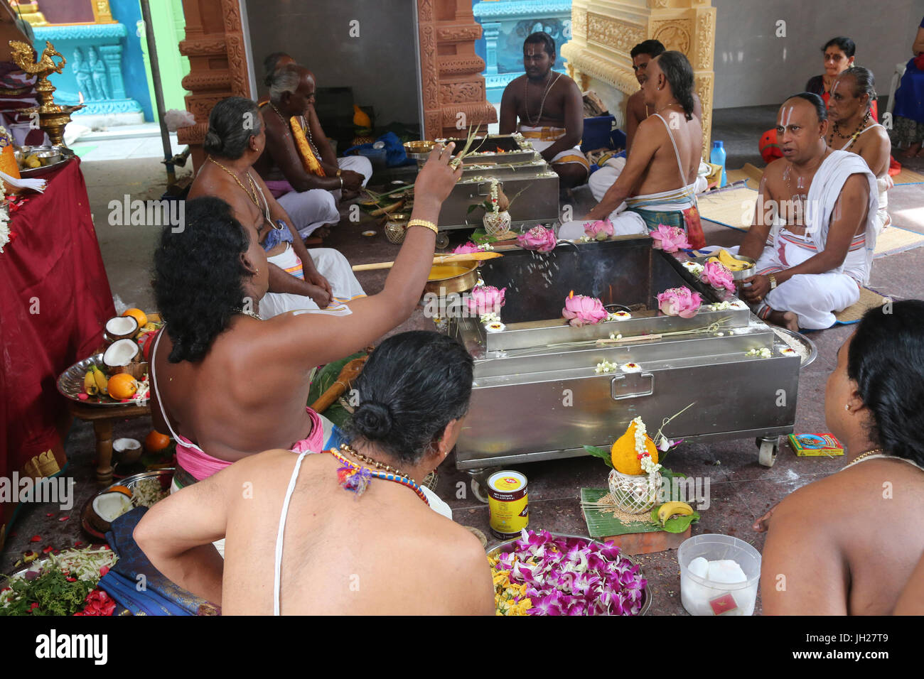 Sri Vadapathira Kaliamman hindu temple. Hindu Brahmin priests.   Puja ceremony.  Vedic fire ceremonies. The ritual of Yajna.  Singapore. Stock Photo