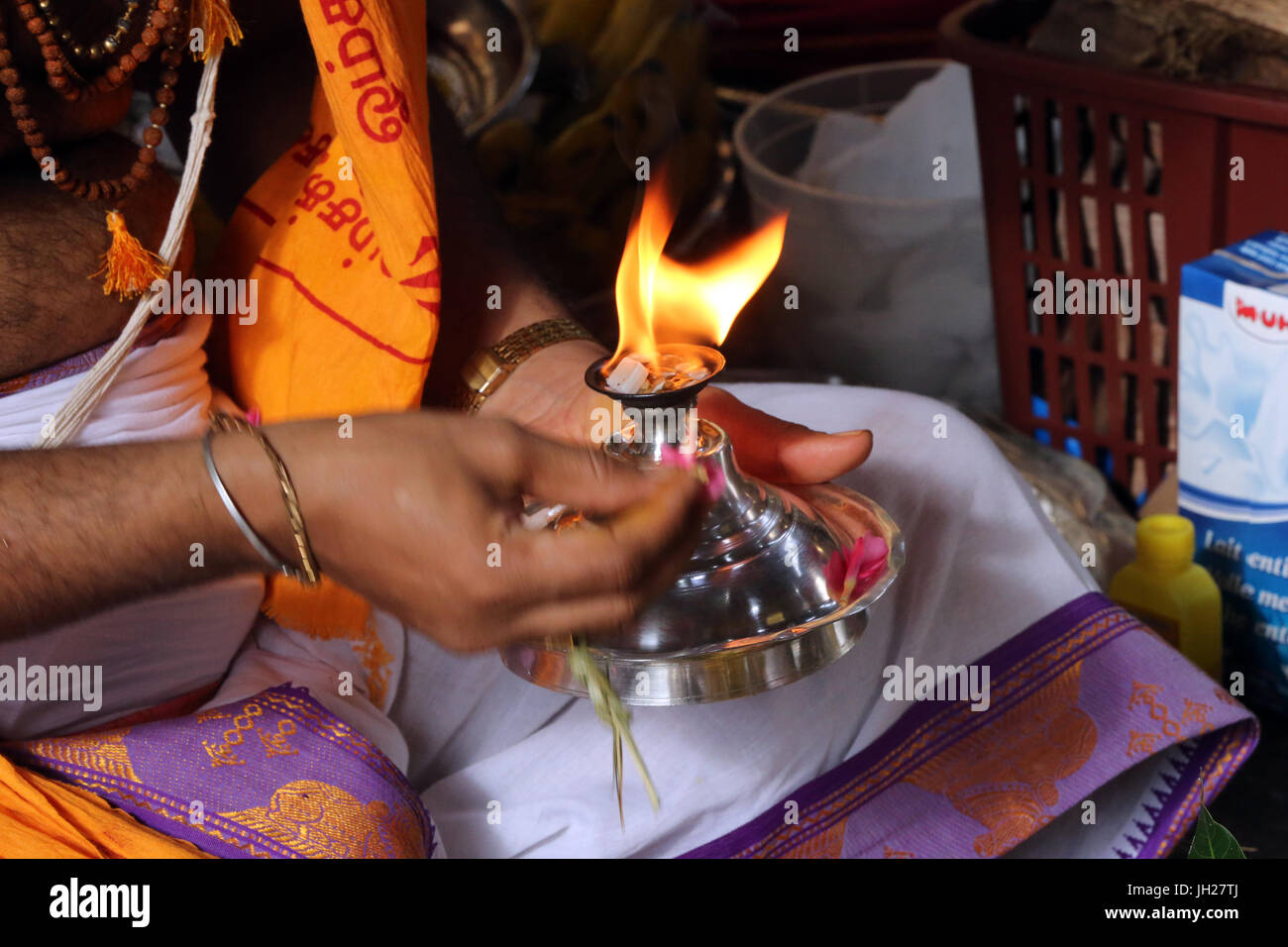 Sri Vadapathira Kaliamman hindu temple. Hindu Brahmin priests. Oil lamp
