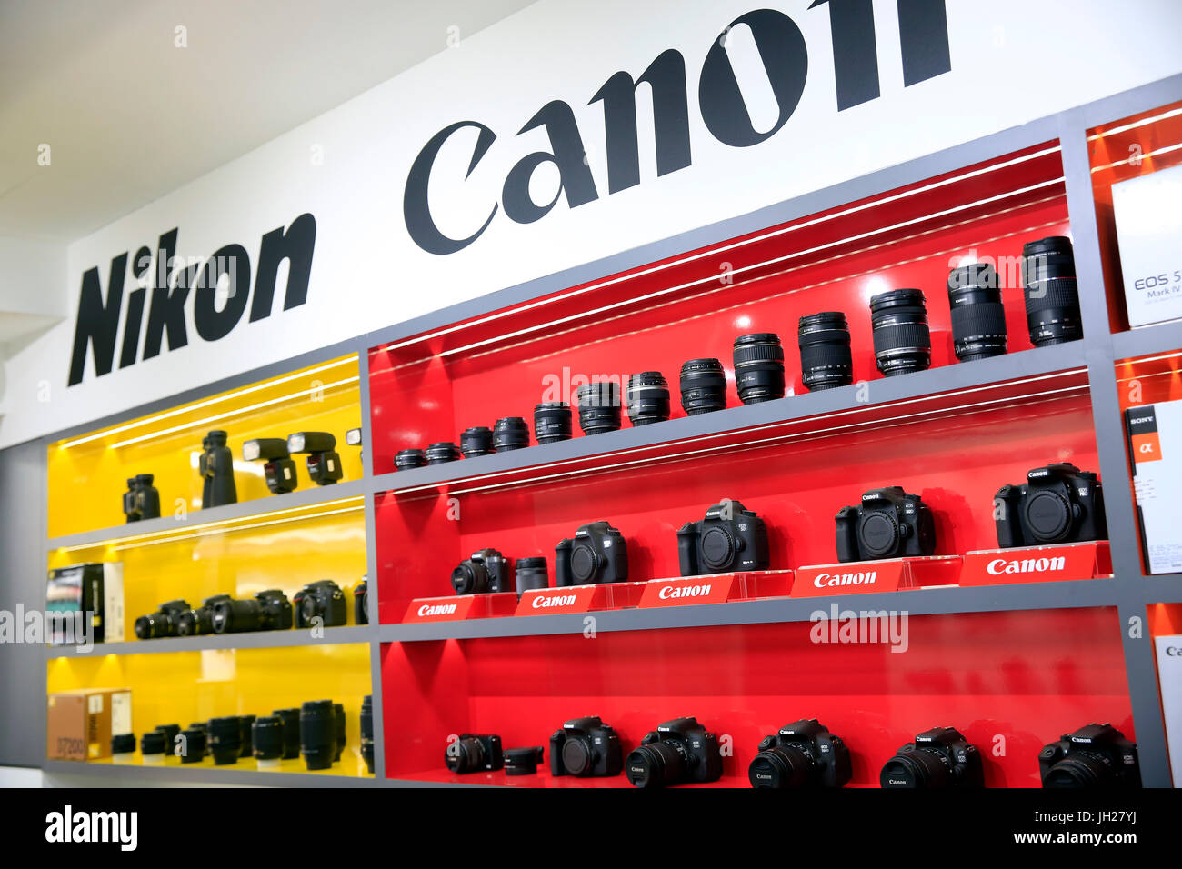 Canon and Nikon cameras for sale In shop.  Singapore. Stock Photo