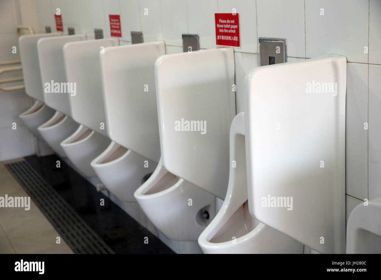 Empty public restroom. Singapore. Stock Photo