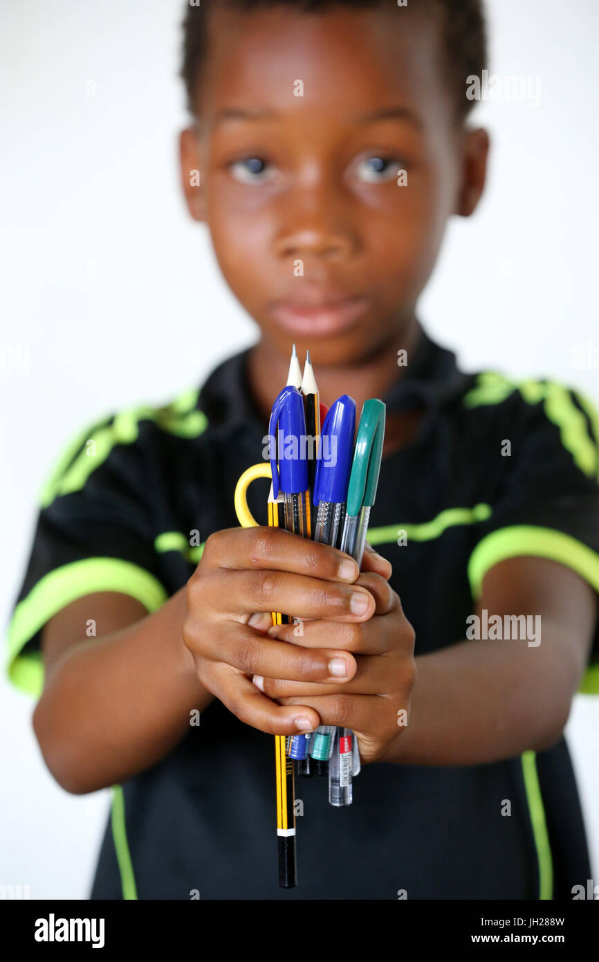 African primary school. Child sponsored by the NGO la Chaine de l'Espoir. Lome. Togo. Stock Photo