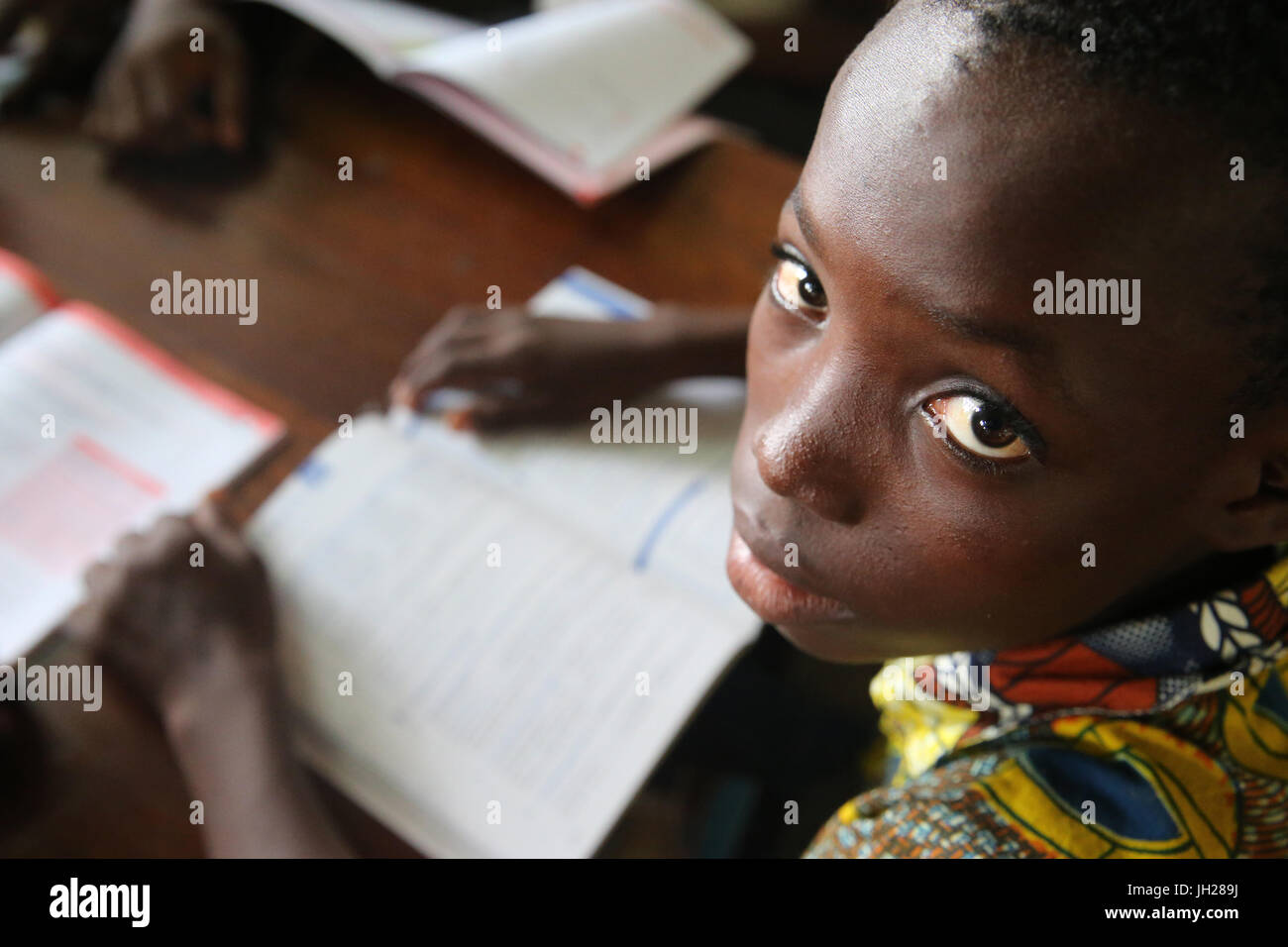African primary school. Child sponsored by french NGO : la Chaine de l'Espoir. The library. Lome. Togo. Stock Photo