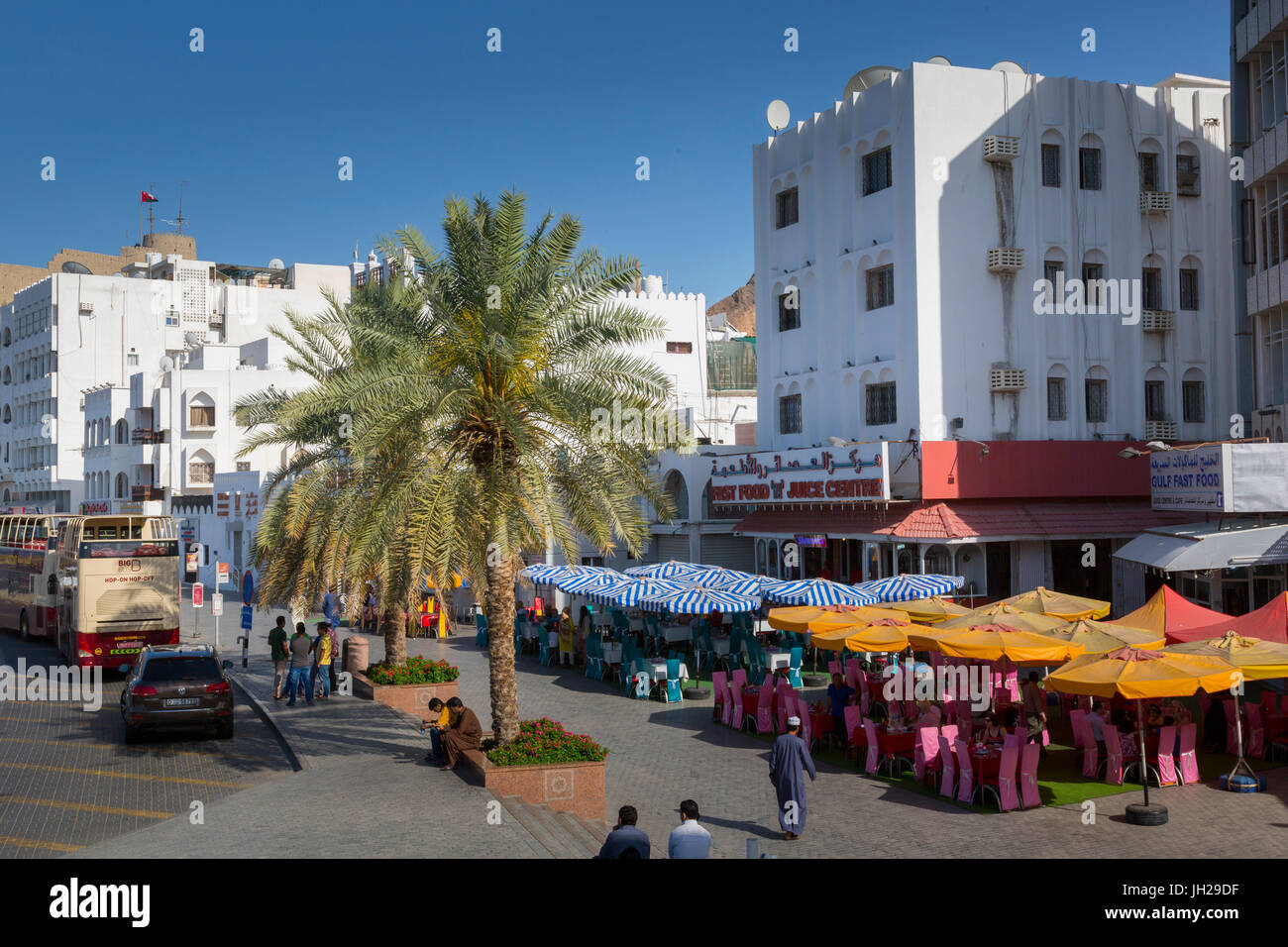 Evening view of restaurants on the Corniche at Muttrah, Muscat, Oman, Middle East Stock Photo