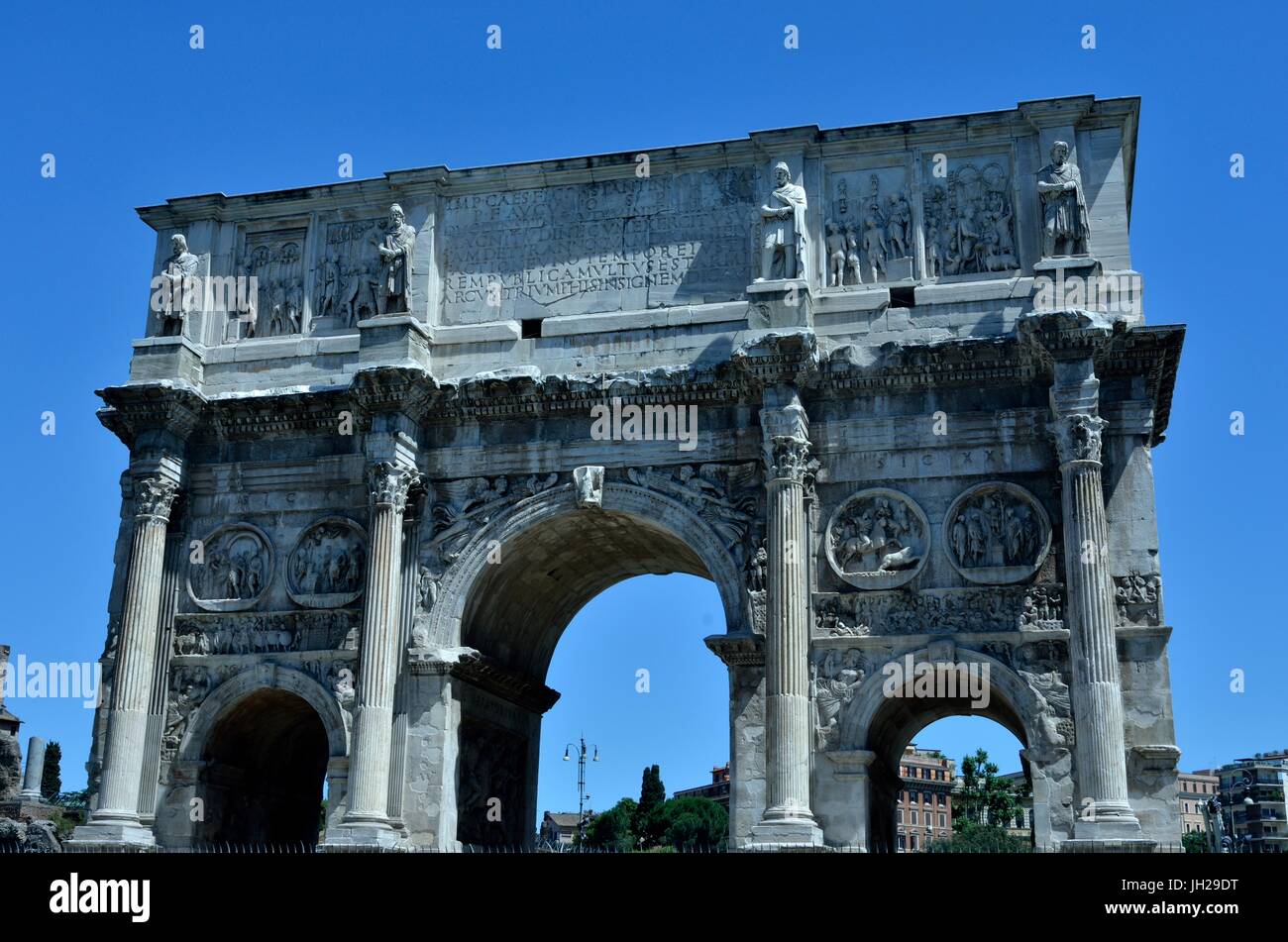 The Arch of Constantine near the Colosseum, Rome, Italy. It was erected by the Roman Senate to commemorate Constantine I's victory over Maxentius Stock Photo