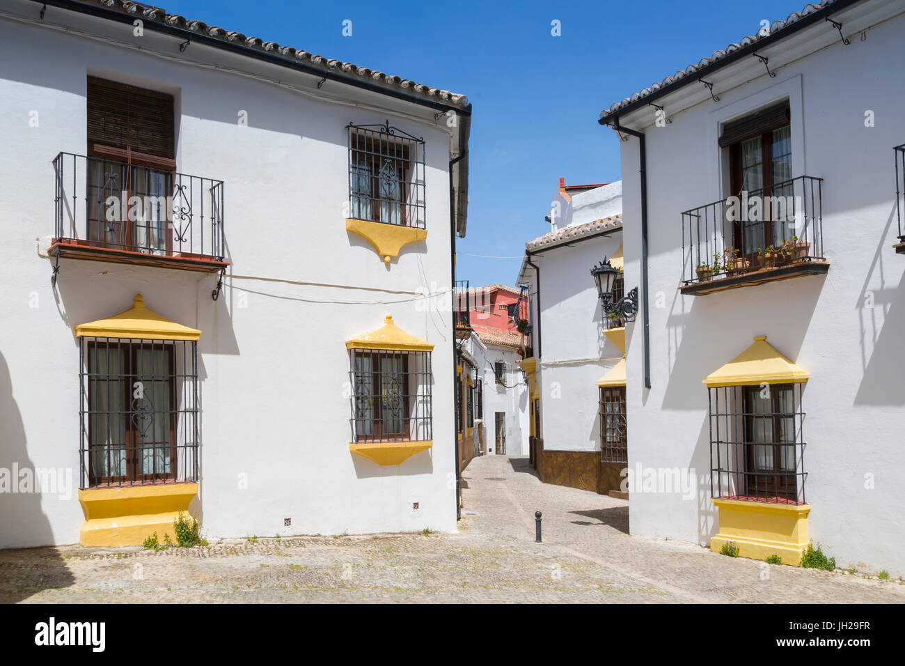 Traditional Spanish whitewashed houses near Plaza Duquesa de Parcent, Ronda, Andalusia, Spain, Europe Stock Photo