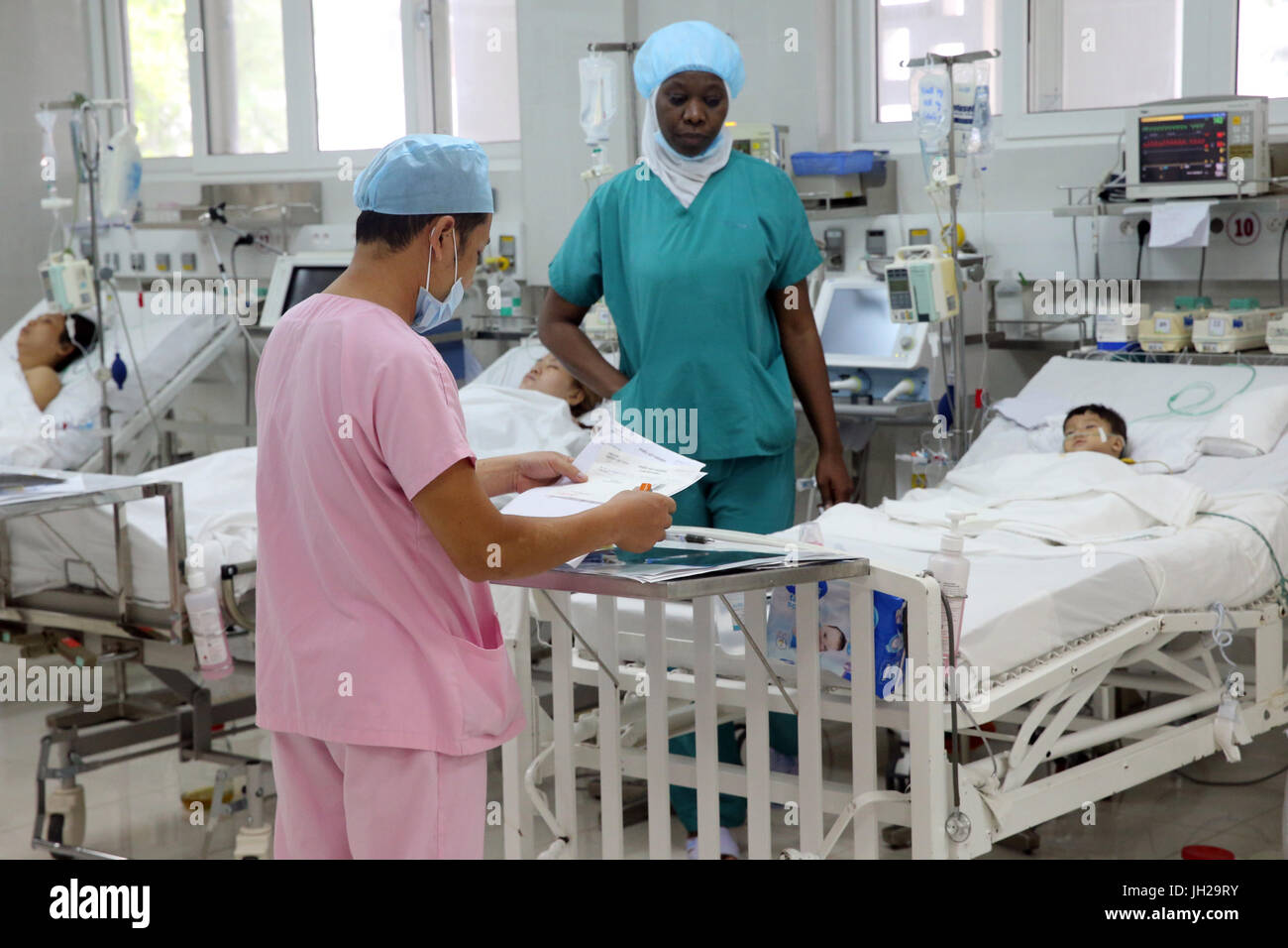 The Heart Institute offer high-quality care to Vietnamese patients suffering from heart diseases.  Senegalese medical team trained to practice cardiac Stock Photo