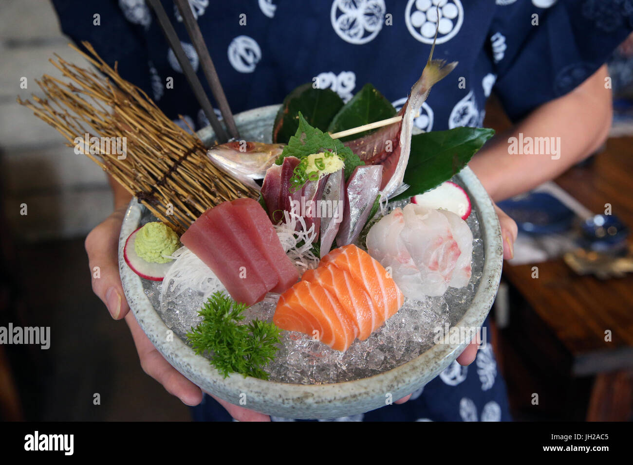 Restaurant. Japanese food. Sushi and sashimi assortment.  Ho Chi Minh City. Vietnam. Stock Photo