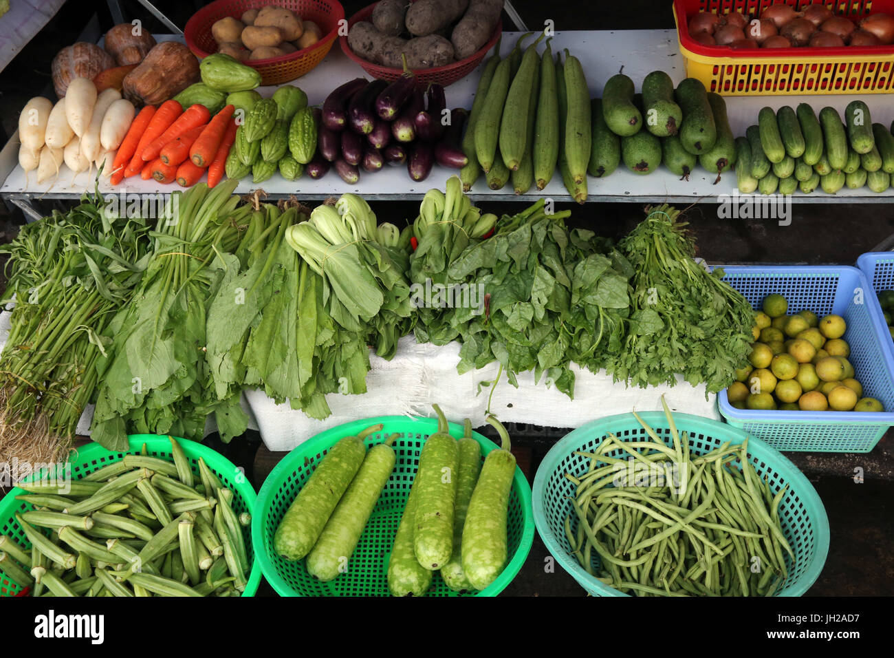 Fresh vegetables at market stall.  Vietnam. Stock Photo