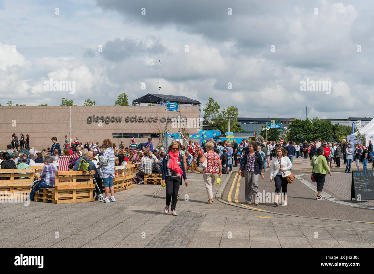 Glasgow, Scotland, UK - August 1, 2014: Members of the public at the Glasgow Science Centre at Pacific Quay in Glasgow. Stock Photo
