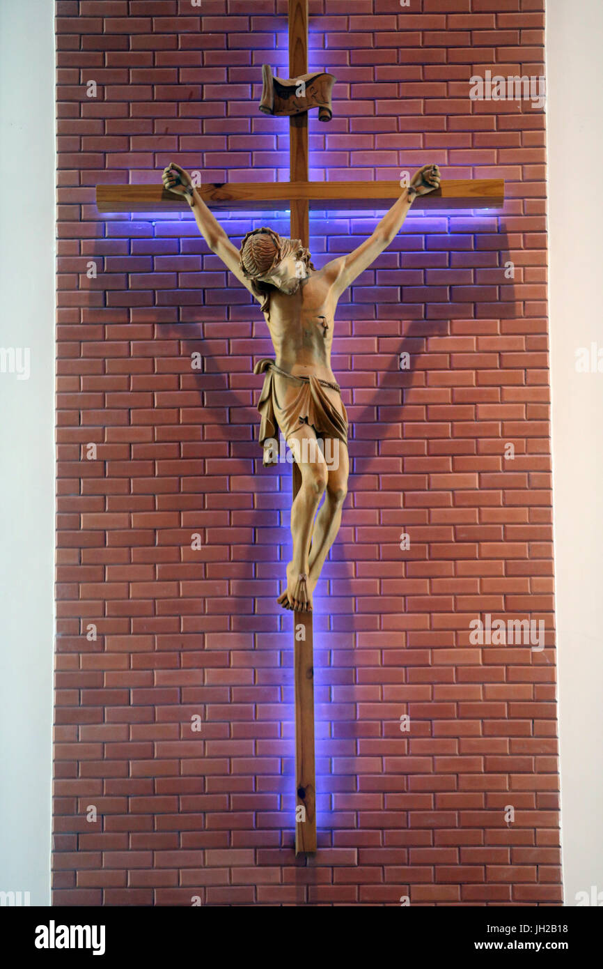 Franciscan missionaries of Mary church.   Jesus on the cross.  Ho chi Minh City. Vietnam. Stock Photo