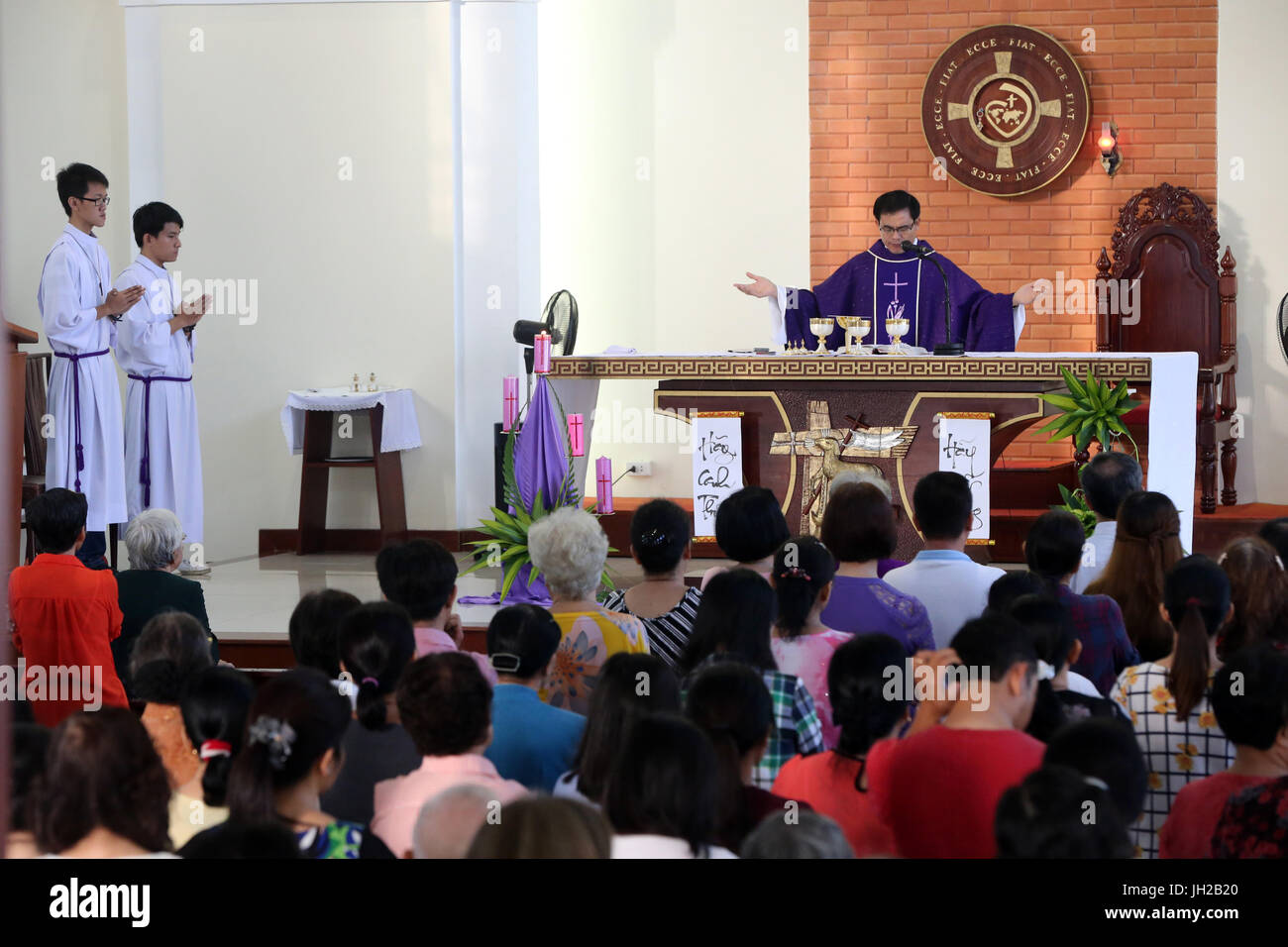 Franciscan missionaries of Mary church.   Sunday morning mass.  Eucharist.  Ho chi Minh City. Vietnam. Stock Photo