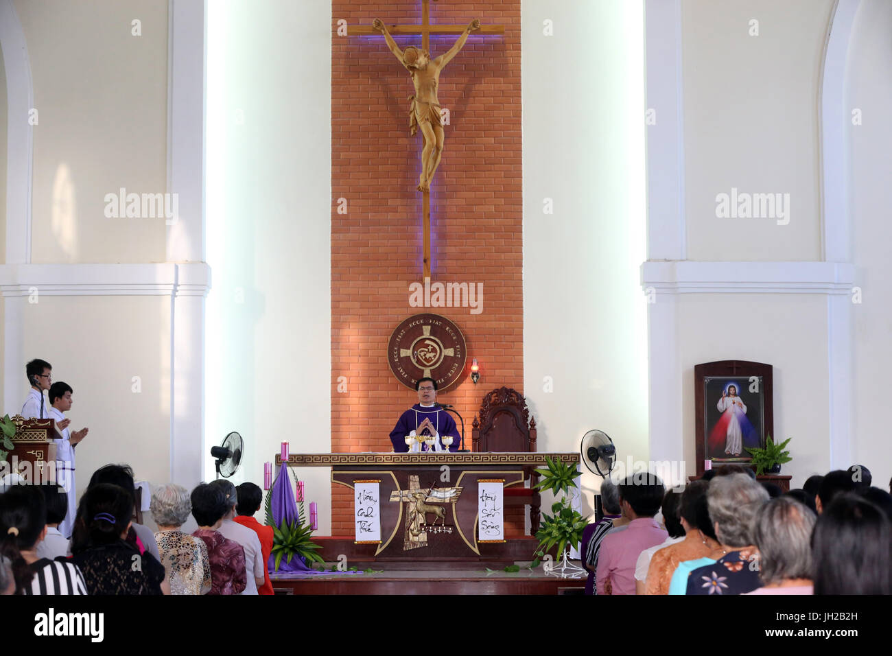 Franciscan missionaries of Mary church.   Sunday morning mass.  Eucharist.  Ho chi Minh City. Vietnam. Stock Photo