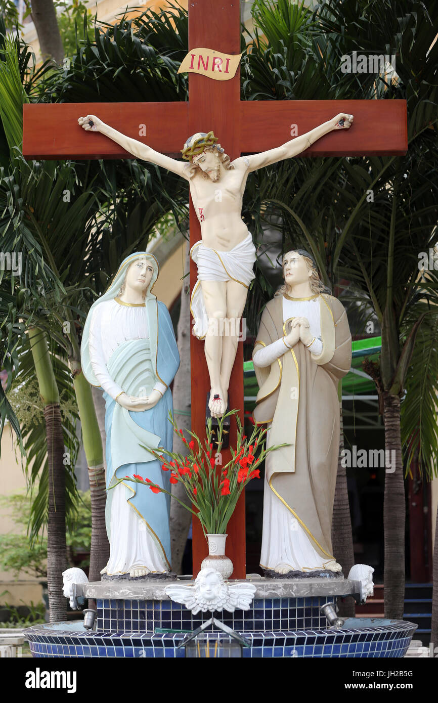 Ho Chi Minh city. St Philip church ( Huyen Sy Church ).  Calvary. Jesus on the cross.  Ho chi Minh City. Vietnam. Stock Photo