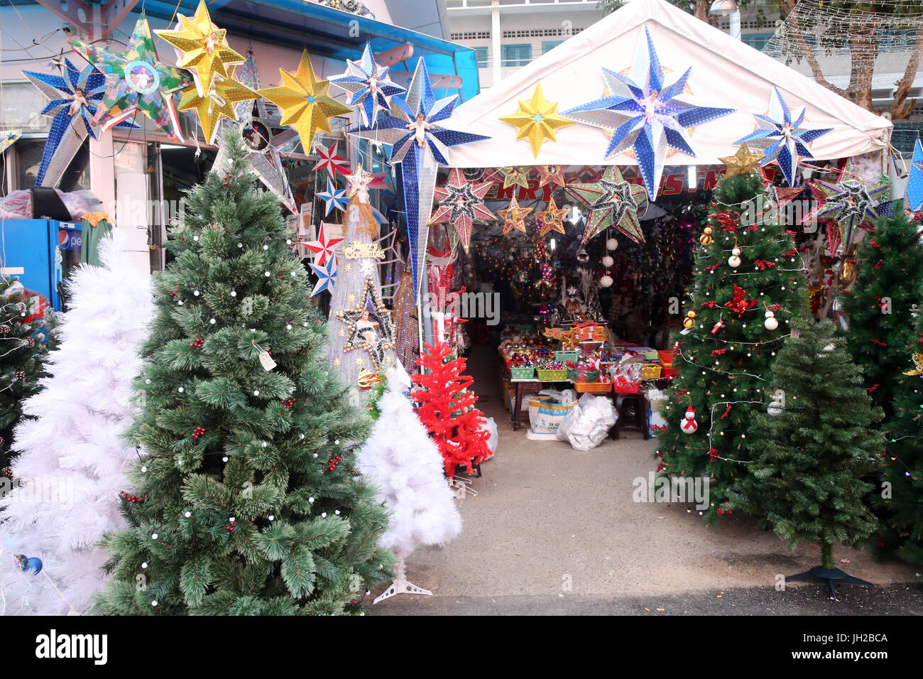 Christmas market.  Christmas tree.  Vietnam. Stock Photo
