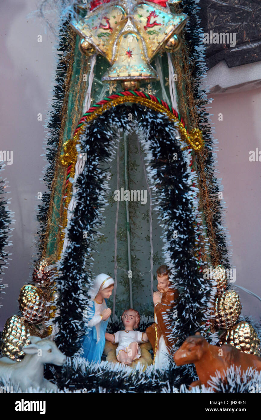 Christmas market.  Christmas crib with baby Jesus. Vietnam. Stock Photo