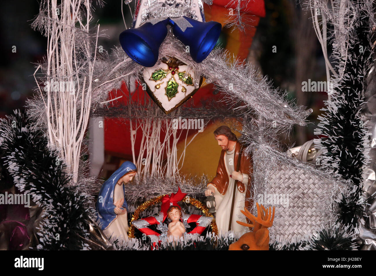 Christmas market.  Christmas crib with baby Jesus. Vietnam. Stock Photo