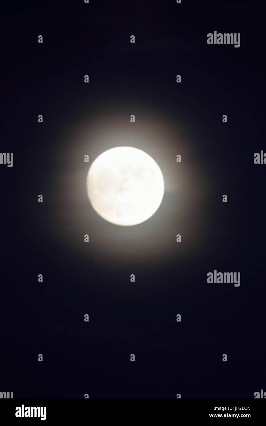 Background Shining full moon in black night sky Stock Photo - Alamy