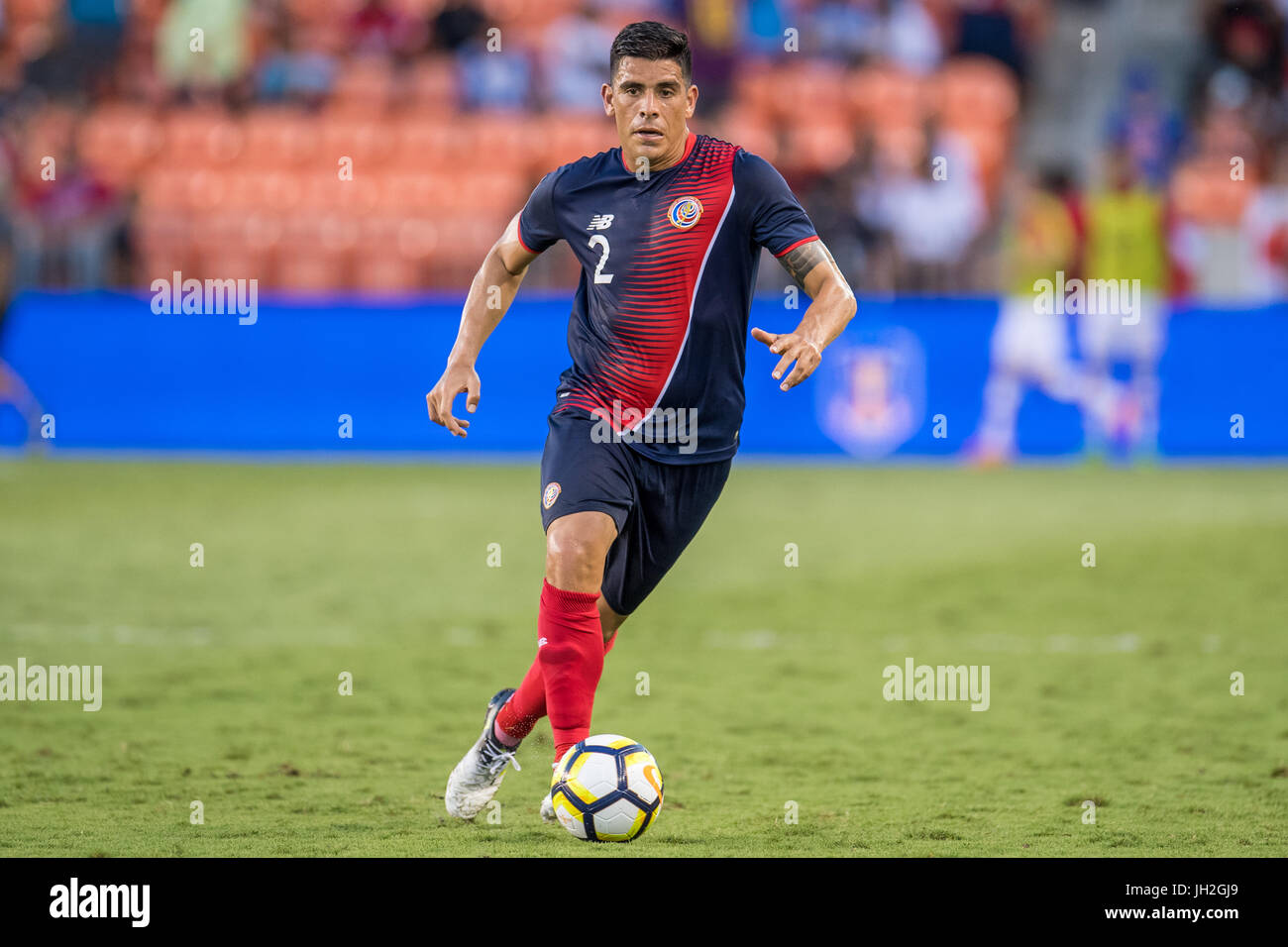 Houston, Texas, USA. 11th July, 2017. Costa Rica defender Johnny Acosta (2) controls the ball during the 2nd half of an international CONCACAF Gold Cup soccer match between Canada and Costa Rica at BBVA Compass Stadium in Houston, TX on July 11th, 2017. The game ended in a 1-1 draw. Credit: Trask Smith/ZUMA Wire/Alamy Live News Stock Photo